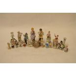 A large quantity of Continental figurines. Est. £40 - £50.