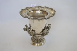 A large good quality Elkington & Co wine cooler decorated with vines and leaves and wavy rim.