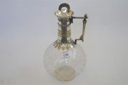 An attractive etched glass claret jug with engraved decoration. Est. £60 - £70.