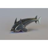 A Georg Jensen silver brooch in the form of two dolphins. Numbered 317. Est. £120 - £140.