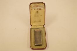 A cased Dunhill lighter. Est. £30 - £40.
