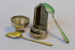 A small Continental hinged top box together with enamel teaspoons etc. Approx 150 grams. Est. £