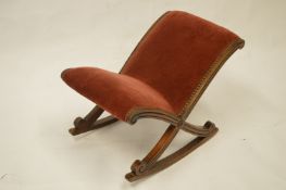 A small Edwardian rocking stool. Est. £20 - £30.