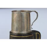 A small plain christening cup with reeded decoration in fitted case. London 1917. Approx. 125 grams.