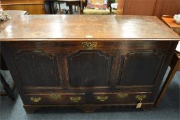 A good Antique oak Georgian style mule chest with lift up cover and two drawers on three bracket
