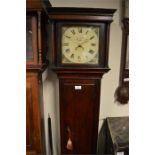 An attractive oak cased cottage Grandfather clock with painted dial. By Sam White of Bideford.