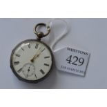 A small silver pocket watch with white enamel dial and engine turned back. Est. £30 - £40.