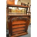 A mahogany chiffonier with moulded decoration and glazed door with barley twist supports. Est. £