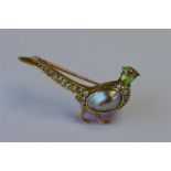 An attractive diamond brooch in the form of a pheasant with pearl body and enamelled head. Approx. 4