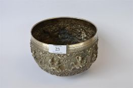 A heavy embossed Continental silver bowl decorated with scrolls and animals. Approx. 1135 grams.
