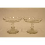 An attractive pair of etched glass sweet dishes with crimped rims. Est. £50 - £60.
