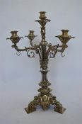 An impressive four branch centre piece decortated with scrolls and swags on square feet. c. 1860.
