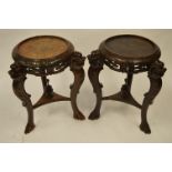 A pair of Continental carved urn stands. Est. £120 - £150.