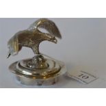 An unusual finial in the form of an eagle with outstretched wings and textured body. Apparently