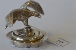 An unusual finial in the form of an eagle with outstretched wings and textured body. Apparently