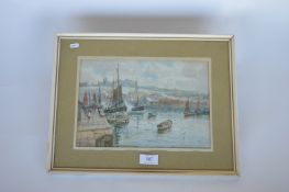 J W WILLIAMS - Whitby harbour, fishing boats at port. Signed. 36cms x 24cms. Est. £150 - £200.