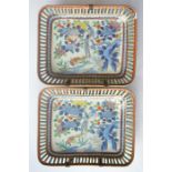 A pair of Japanese Imari rectangular wall plates decorated with flowers. Approx 29 cms x 23 cms.