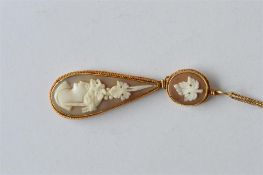 An attractive teardrop cameo of a lady's head with vine decoration on fine link chain. Est. £90 - £