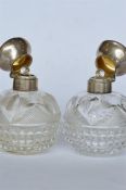 A good pair of hobnail cut scent bottles with engine turned decoration. London. By M&W. Est. £