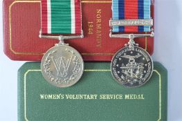 Cased WRVS Long service medal and Cased Normandy commemorative medal (numbered). Est. £20 - £30.