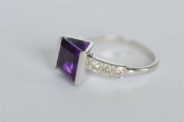 A good quality amethyst and diamond seven stone ring in white gold claw mount. Est. £330 - £360