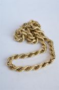 A large heavy 9 ct rope twist neck chain with ring clasp. Approx. 28 grams. Est. £260 - £280.