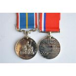 2x UK commemoratives; Cold War and National Service. Est. £15 - £20.