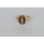 A 9ct banded agate and rose diamond cluster ring. Est. £400 - £450.