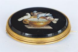 A good gold framed micro mosaic brooch of birds in gold frame. Est. £700 - £800.