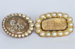 An attractive gold and pearl oval mourning brooch together with one other. Est. £20 - £30