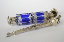 An unusual Russian silver pointer set with lion, together with a plated double ended scent bottle.