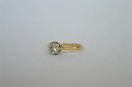 A good diamond single stone ring in 18 ct claw mount. Est. £600 - £700.