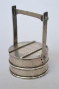 Another similar in the form of a barrel in stand. Approx. 30 grams. Est. £30 - £40.