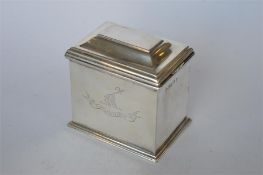 A good quality George III hinged top box with step base decorated with armorial. London 1803. By