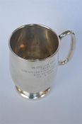 A heavy pint tankard on pedestal foot. Sheffield. By EV. Approx. 338 grams. Est. £70 - £80.