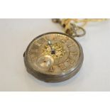 An Antique silver pocket watch, the dial decorated with flowers and leaves. Est. £25 - £30.