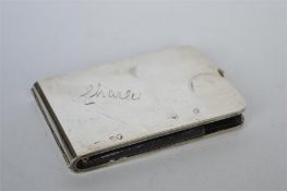 A stylish spring mounted card case with circular thumb piece. London 1886. By AJ. Approx. 100 grams.