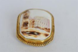 An unusual rectangular cameo of a street scene in rope twist frame. Est. £50 - £60.