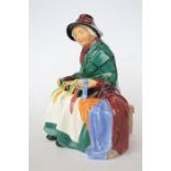 A Royal Doulton figure  of "Silks and Ribbons". HN number 2017. Est. £20 - £30.