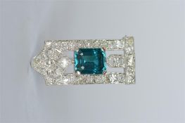 A good quality Art Deco diamond and topaz clip brooch in white gold. Est. £600 - £700.