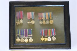 Framed collection of British miniature medals including OBE, MBE, South Africa 1900, India General