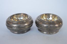 A pair of early circular trencher salts with reeded decoration. Approx 130 grams. Est. £150 - £200.
