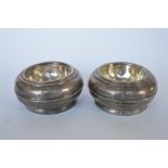 A pair of early circular trencher salts with reeded decoration. Approx 130 grams. Est. £150 - £200.