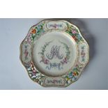 A pierced Dresden cabinet plate with decorated floral motifs. Est. £10 - £15.