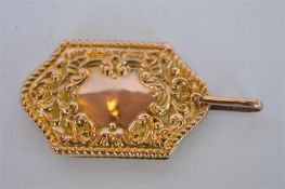 An attractive scroll decorated 9ct aide memoire with loop top. Birmingham 1900. Approx. 13 grams.