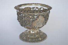 A good quality pierced Victorian sugar bowl with glass liner, attractively decorated with flowers
