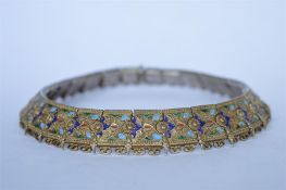A good enamel decorated Russian necklace with concealed clasp. Est. £300 - £350.