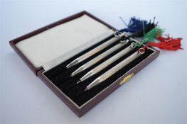 A boxed set of six good quality bridge pens marked Sterling. Est. £50 - £60.