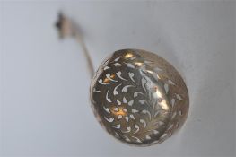 A good Georgian bottom marked sifter spoon, the bowl decorated with swirls. Approx 40 grams. Est. £