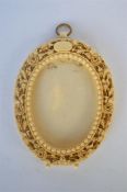 A good oval carved ivory picture frame with loop top and ball feet. Approx. 12 cms high by 9 cms